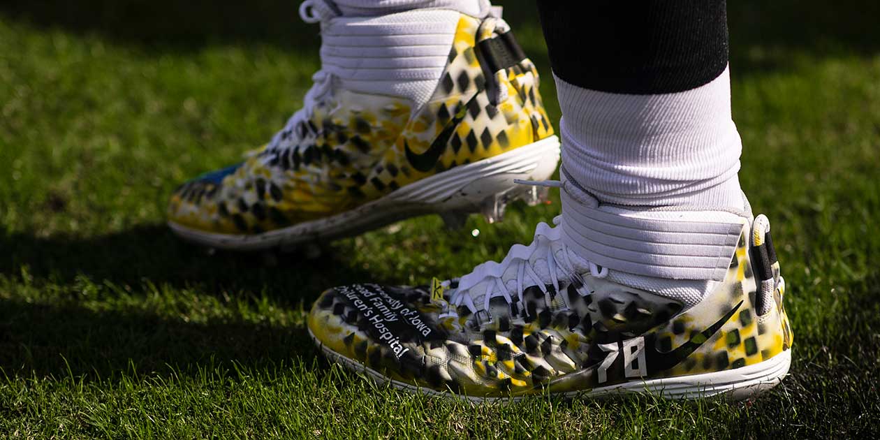 Tristan Wirfs UI Chlidrens Hospital Cleats